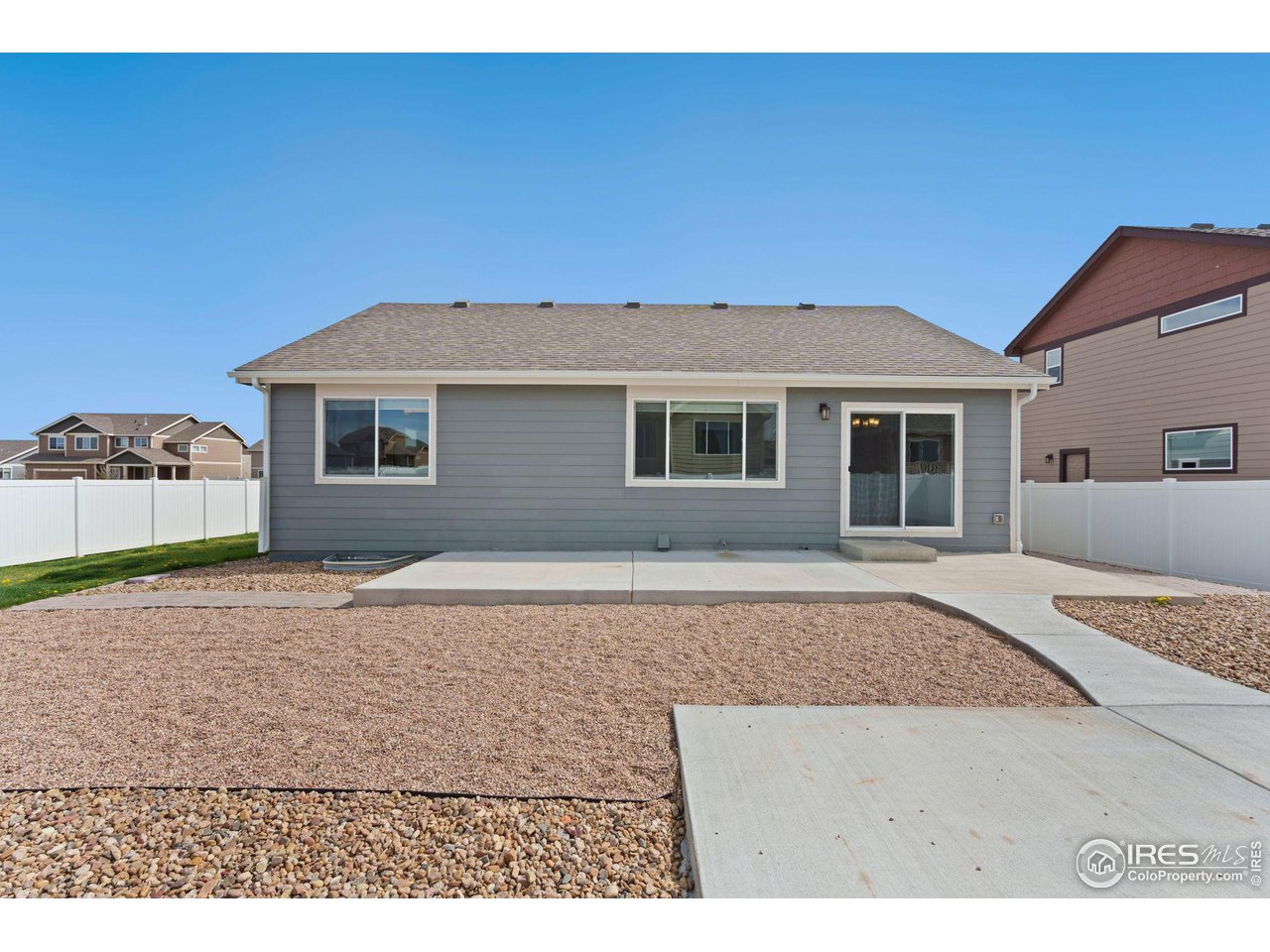 856 Sunlight Peak Drive Severance, CO 80550 - Photo 37 of 40 a house view with a backyard space