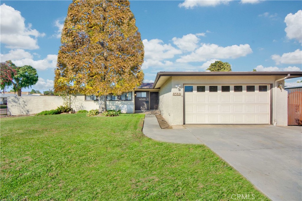 8569 Woodford Way Riverside, CA 92504 - Photo 1 of 1 a view of outdoor space yard and front view of a house
