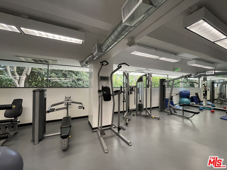 2222 Avenue Of The Stars, Unit 705 Los Angeles, CA 90067 - Photo 31 of 36 a view of a room with gym equipment