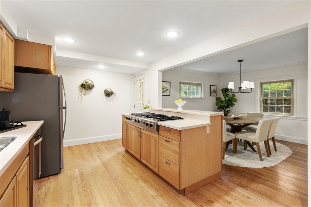 163 Day Street Newton, MA 02466 - Photo 7 of 20 a kitchen with a stove and a wooden floor