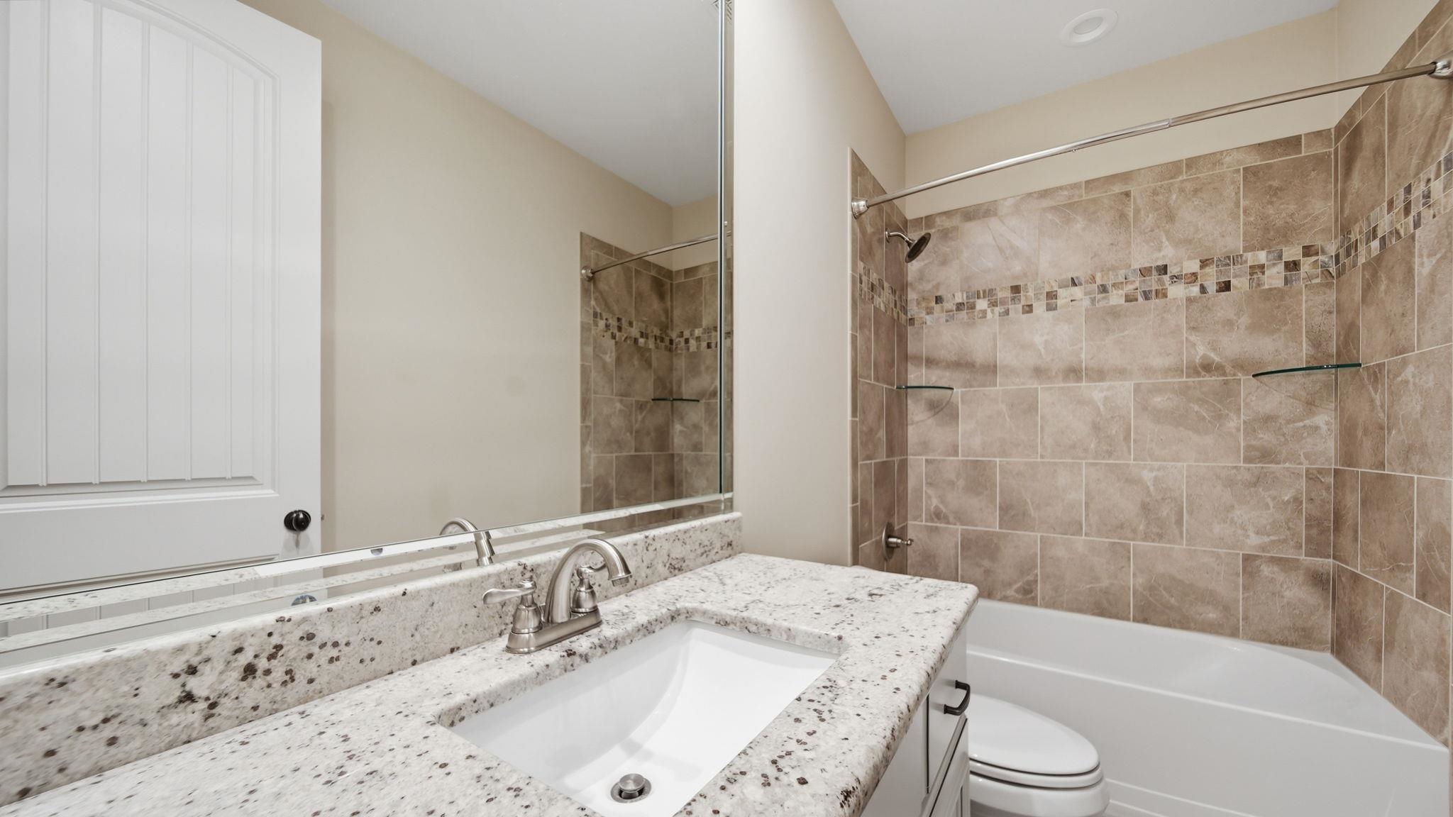 1058 Shanborne Cove Collierville, TN 38017 - Photo 15 of 39 Bathroom featuring vanity and shower / bath combination