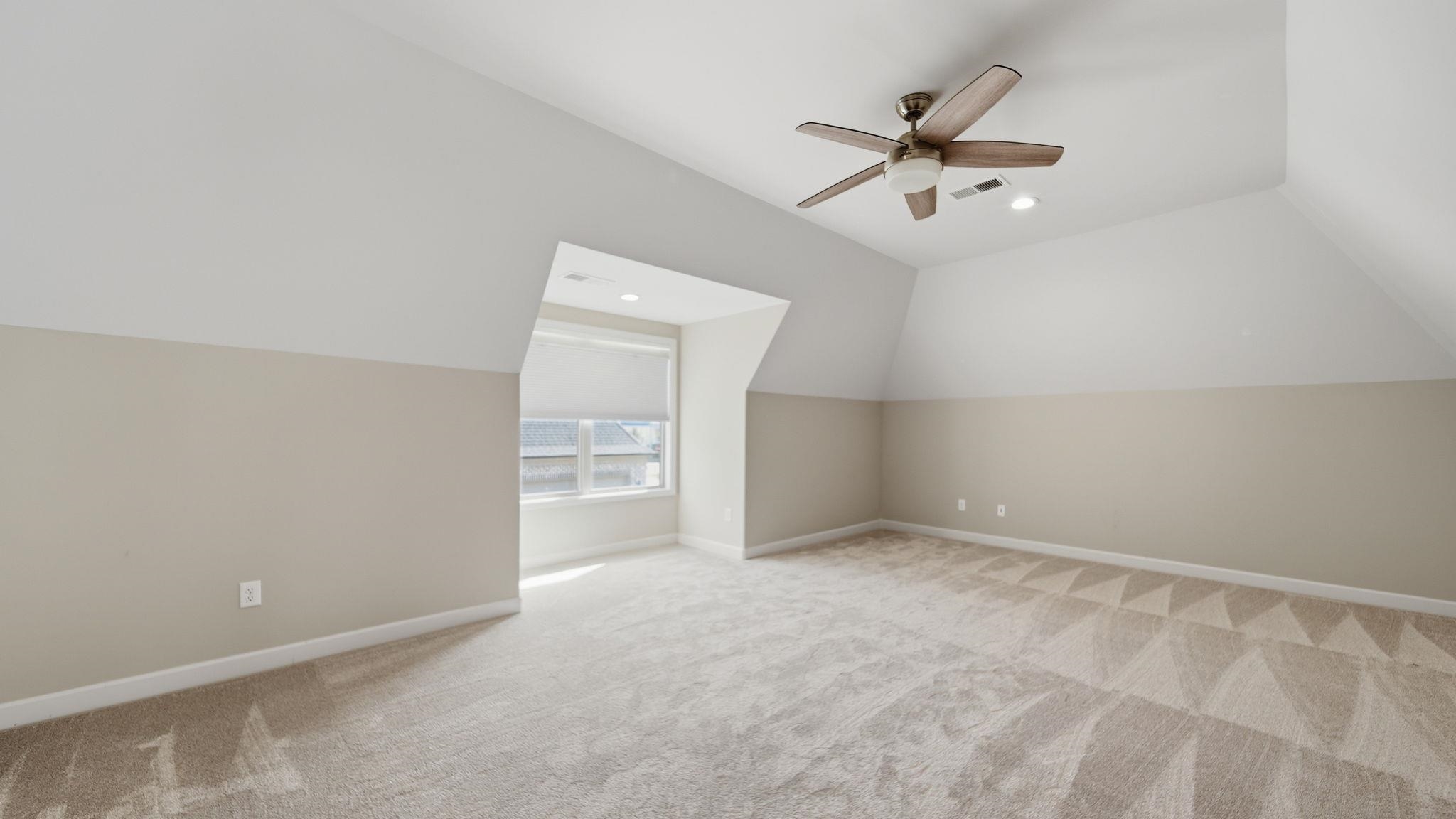 1058 Shanborne Cove Collierville, TN 38017 - Photo 28 of 39 Bonus room featuring lofted ceiling, light carpet, a ceiling fan, and recessed lighting