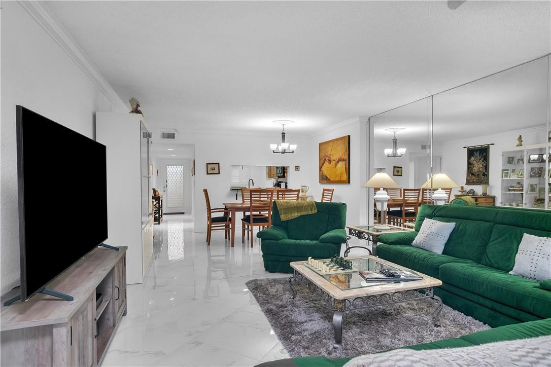 5574 Witney Drive, Unit 109 Delray Beach, FL 33484 - Photo 11 of 21 OPEN CONCEPT LIVING AREA