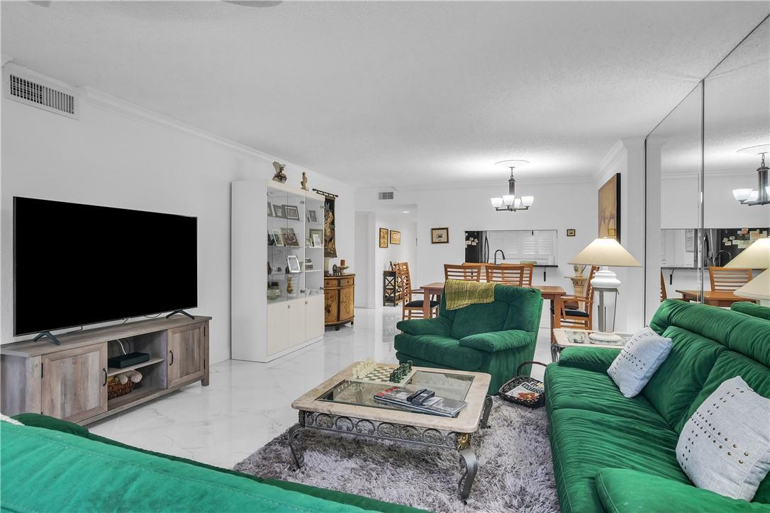 5574 Witney Drive, Unit 109 Delray Beach, FL 33484 - Photo 12 of 21 OPEN CONCEPT LIVING AREA