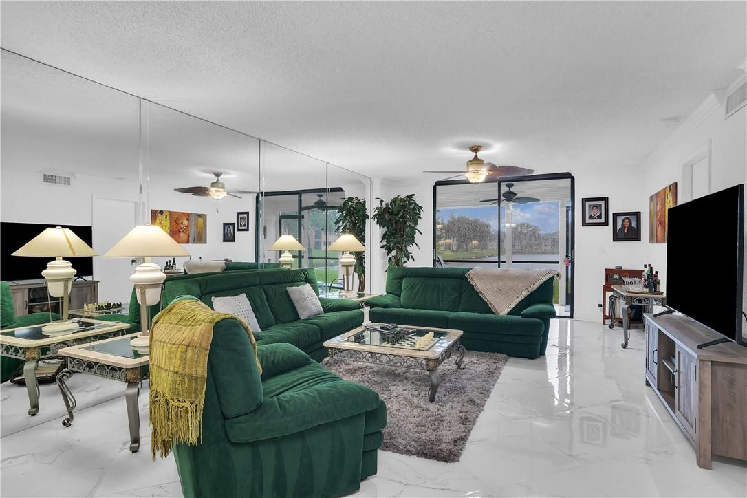 5574 Witney Drive, Unit 109 Delray Beach, FL 33484 - Photo 9 of 21 OPEN CONCEPT LIVING AREA