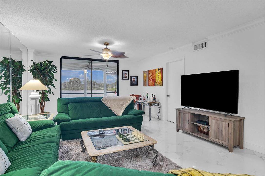 5574 Witney Drive, Unit 109 Delray Beach, FL 33484 - Photo 10 of 21 OPEN CONCEPT LIVING AREA