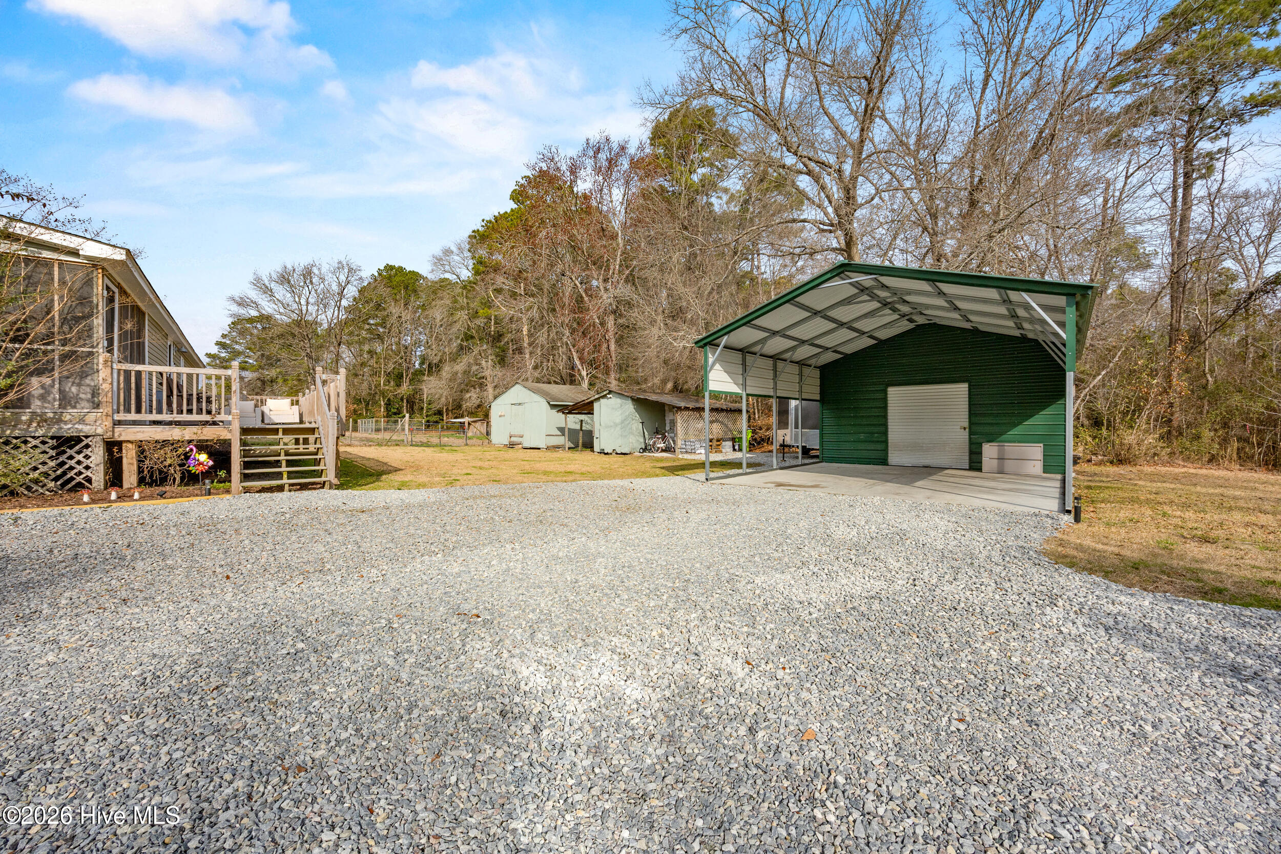 1772 Maco Road Northeast Leland, NC 28451 - Photo 29 of 43 Covered Carport with Storage Shed