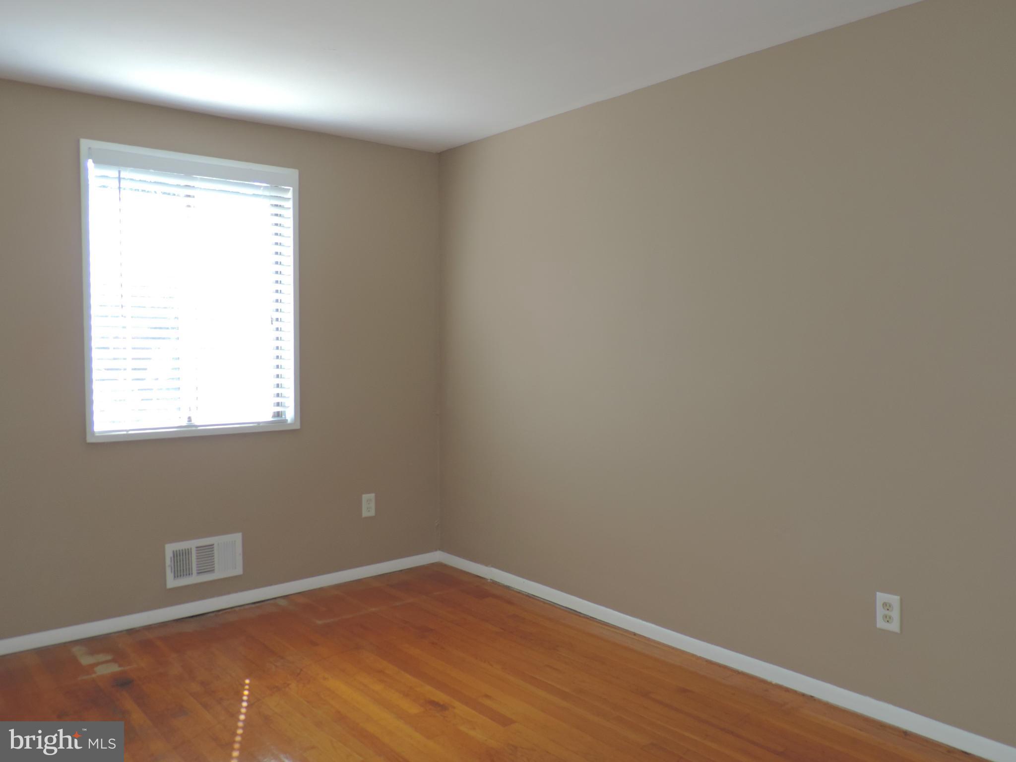 952 Bayner Road Essex, MD 21221 - Photo 11 of 17 an empty room with a window