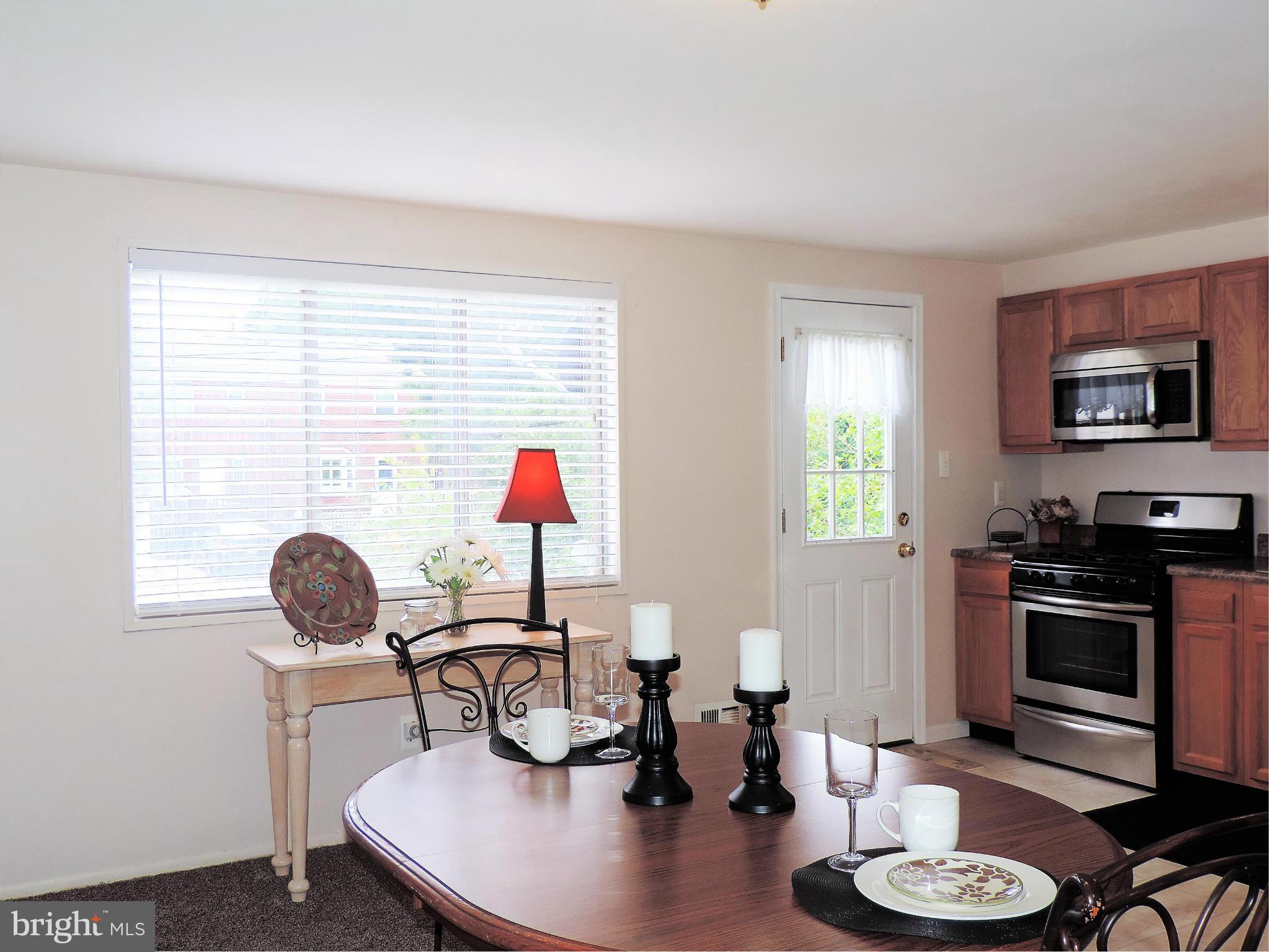 952 Bayner Road Essex, MD 21221 - Photo 6 of 17 a room with furniture and a window