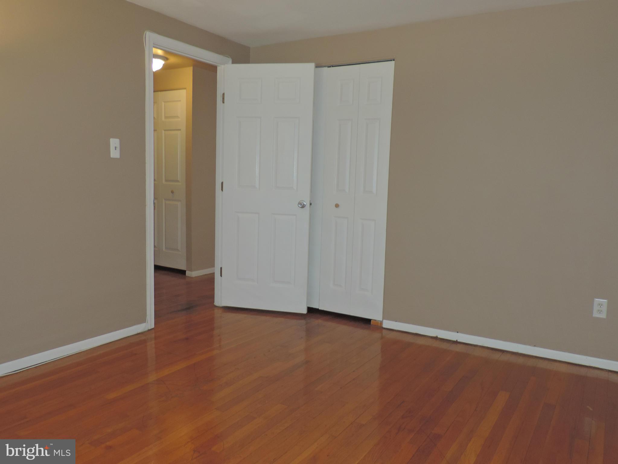 952 Bayner Road Essex, MD 21221 - Photo 10 of 17 a view of an empty room with closet and a window