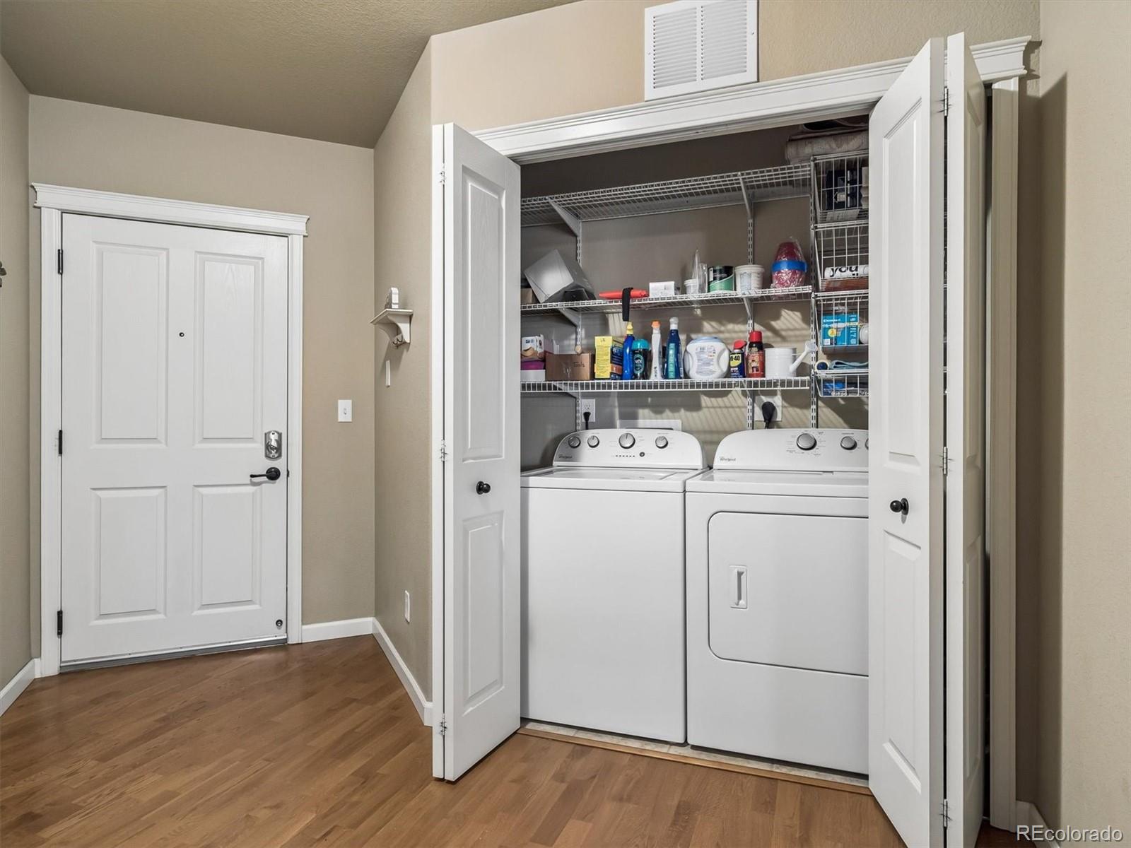 1144 Rockhurst Drive, Unit 107 Highlands Ranch, CO 80129 - Photo 18 of 29 a room with storage and utility