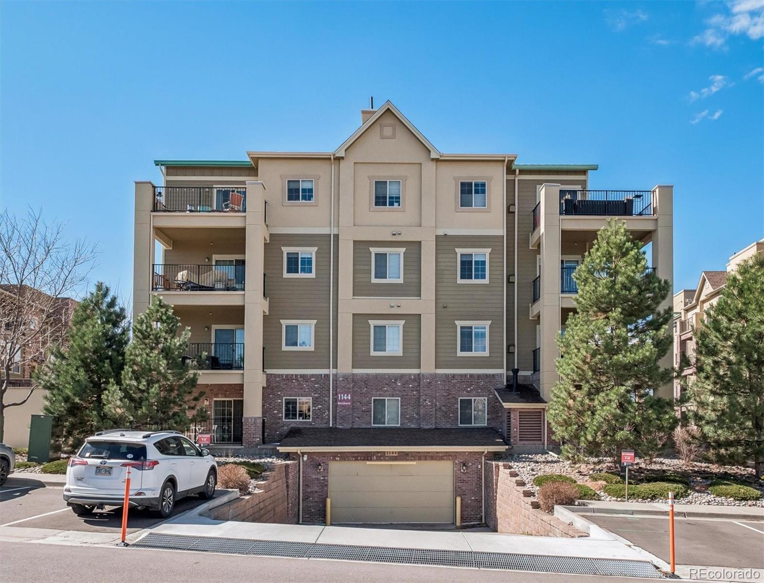 1144 Rockhurst Drive, Unit 107 Highlands Ranch, CO 80129 - Photo 22 of 29 a building view