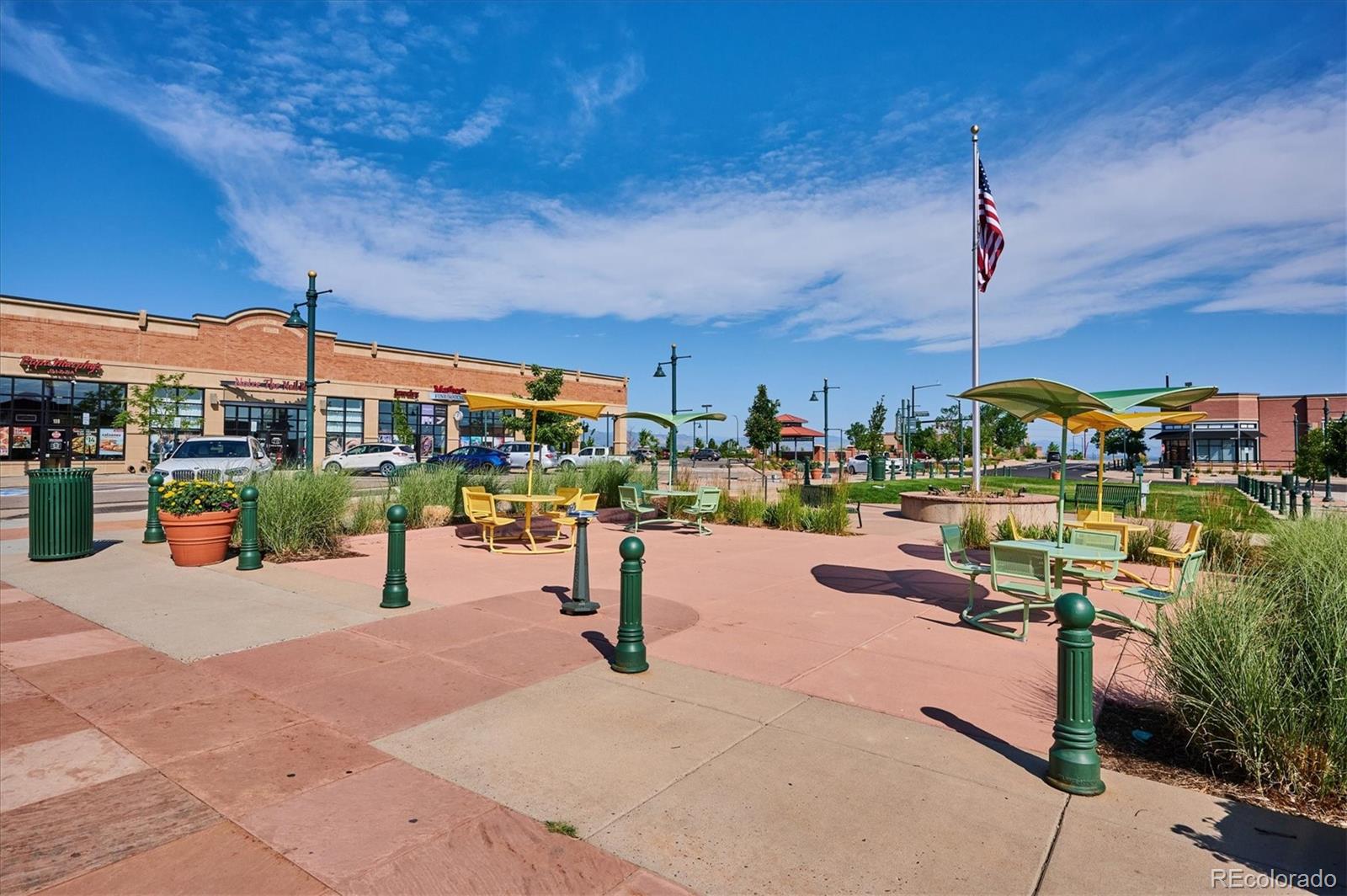 1144 Rockhurst Drive, Unit 107 Highlands Ranch, CO 80129 - Photo 26 of 29 a view of a terrace with sitting space