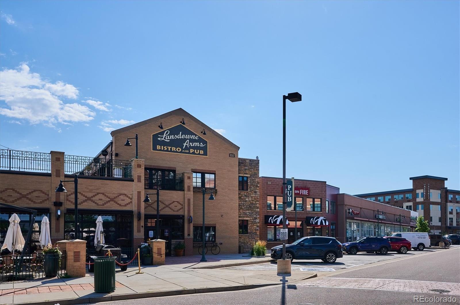 1144 Rockhurst Drive, Unit 107 Highlands Ranch, CO 80129 - Photo 28 of 29 a front view of a building with street view