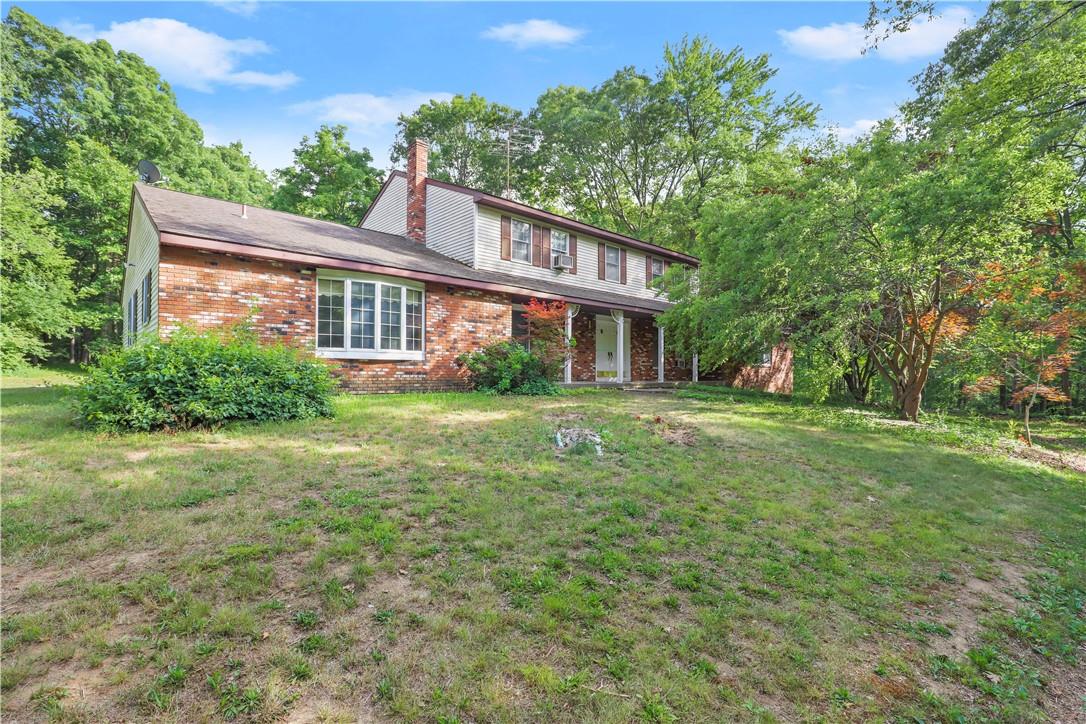 244 Jaycox Road Cold Spring, NY 10516 - Photo 1 of 1 a house view with a garden space