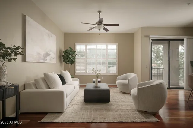 a living room with furniture and a large window