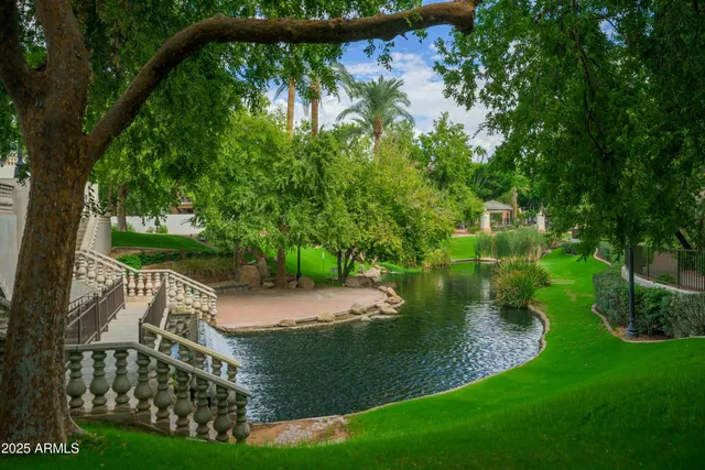a view of a garden from a balcony