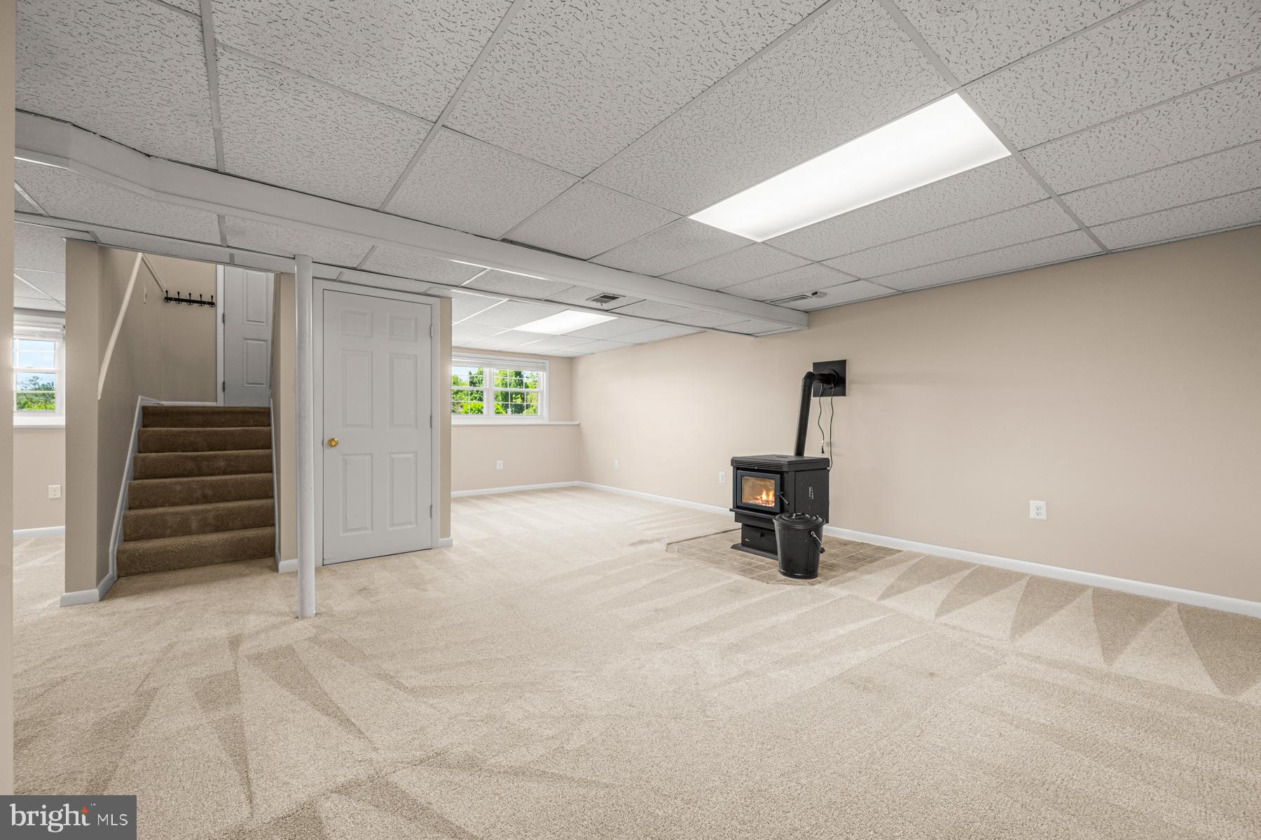 4285 Wolf Hill Drive Hampstead, MD 21074 - Photo 20 of 49 a view of an empty room with stairs and a window