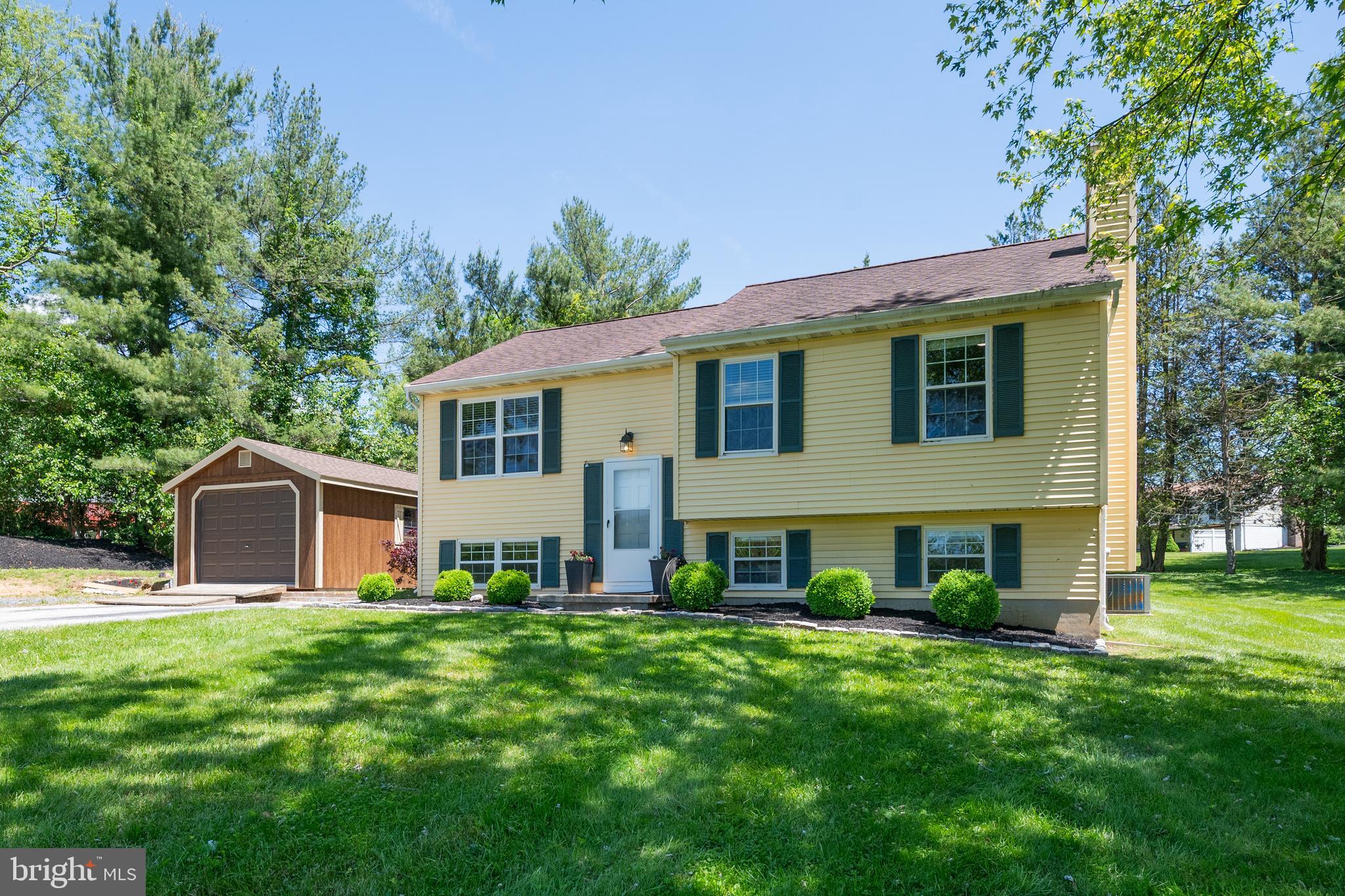 4285 Wolf Hill Drive Hampstead, MD 21074 - Photo 2 of 49 a view of a house with a yard porch and sitting area