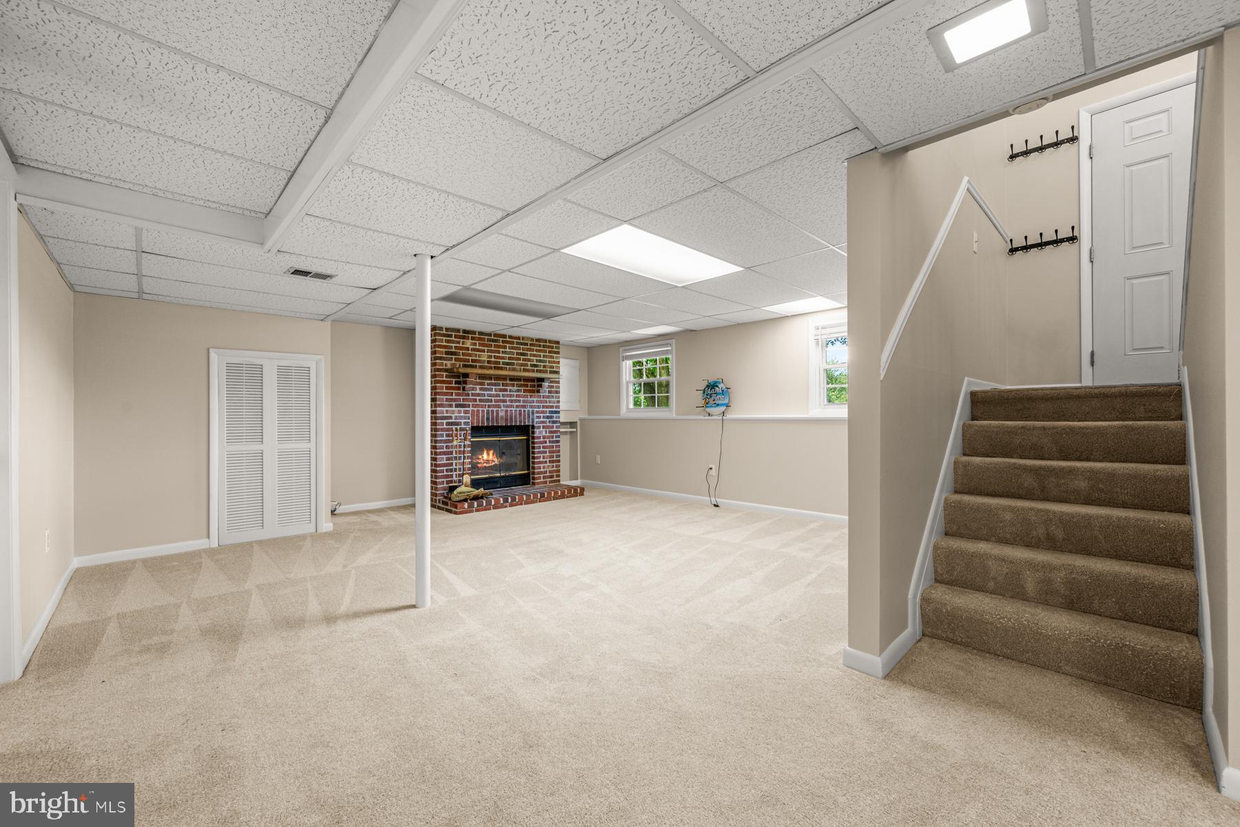 4285 Wolf Hill Drive Hampstead, MD 21074 - Photo 27 of 49 a view of an empty room with stairs and a cabinet