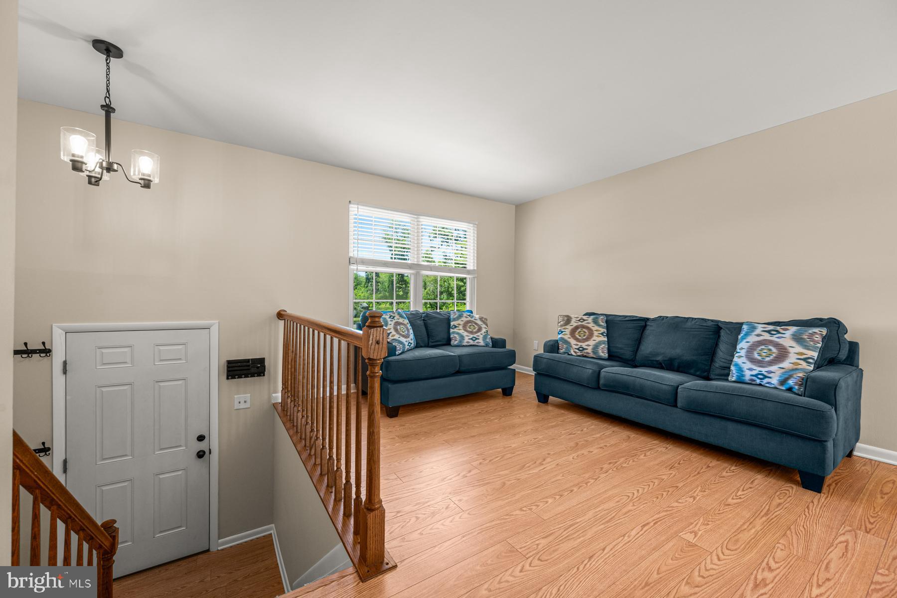4285 Wolf Hill Drive Hampstead, MD 21074 - Photo 3 of 49 a living room with furniture a couch and a window