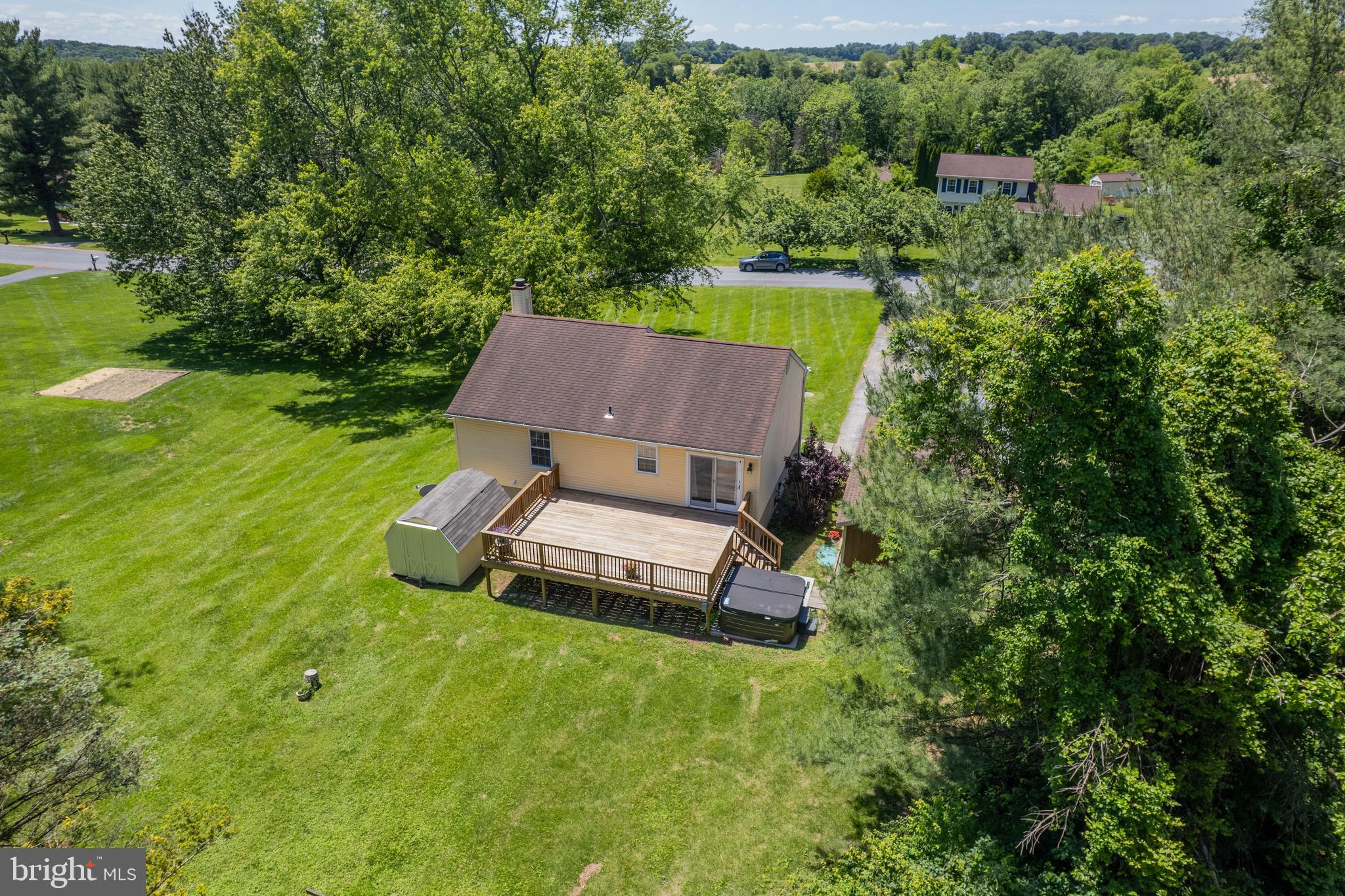 4285 Wolf Hill Drive Hampstead, MD 21074 - Photo 32 of 49 an aerial view of a house with swimming pool a yard and outdoor seating