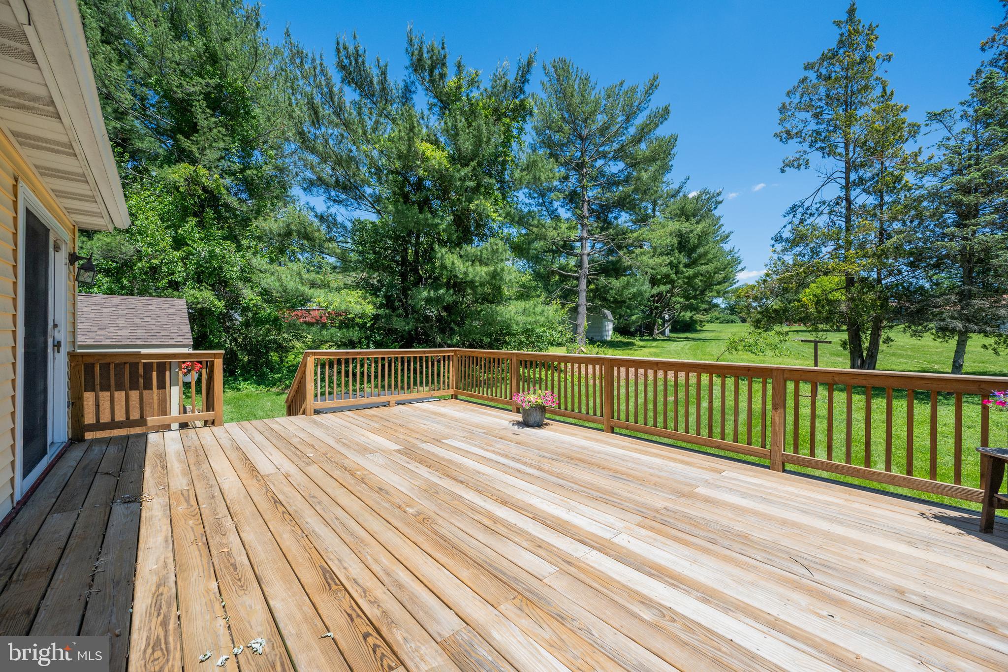 4285 Wolf Hill Drive Hampstead, MD 21074 - Photo 34 of 49 a balcony with view of trees in the background