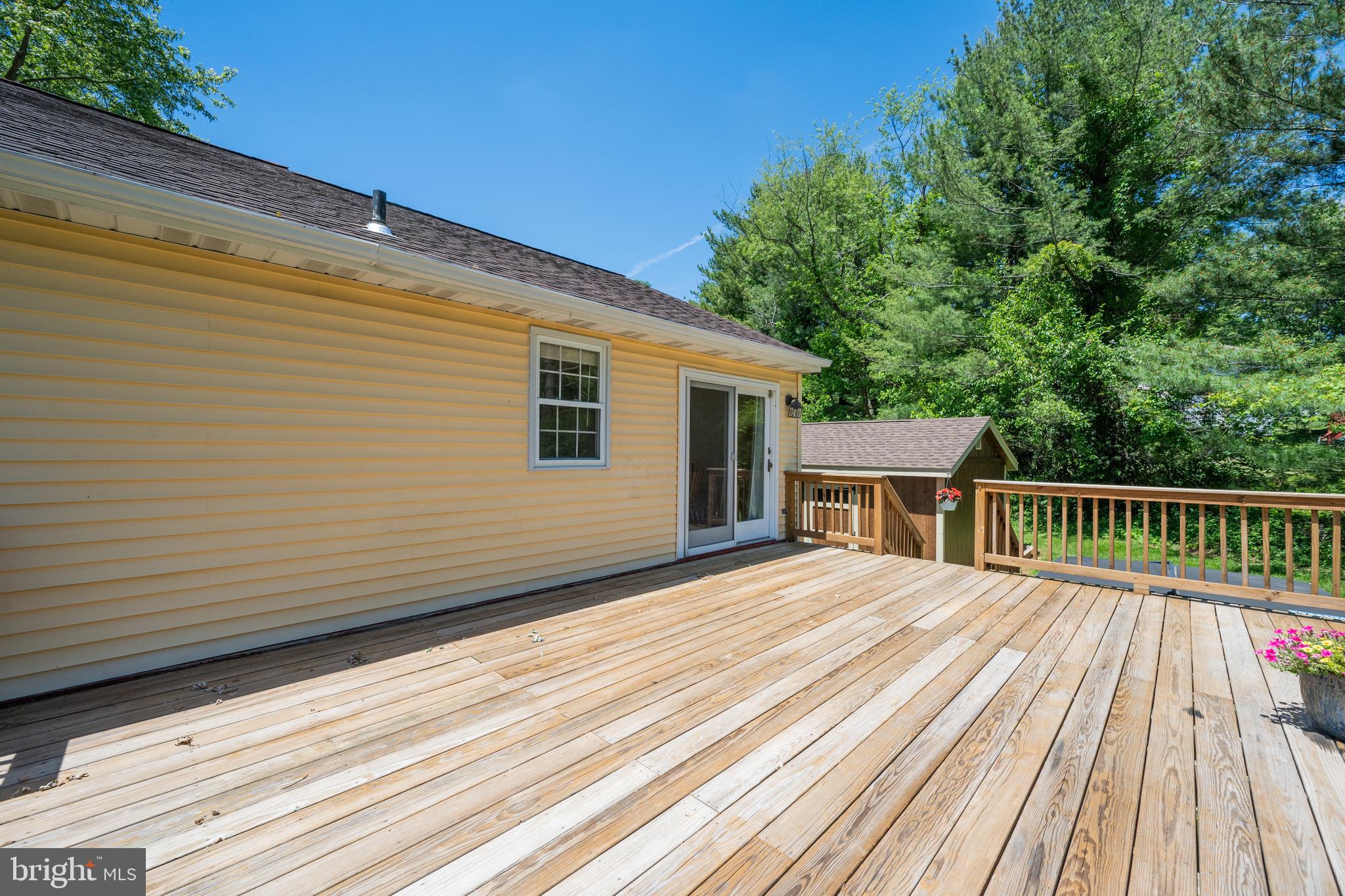 4285 Wolf Hill Drive Hampstead, MD 21074 - Photo 35 of 49 a view of a wooden deck