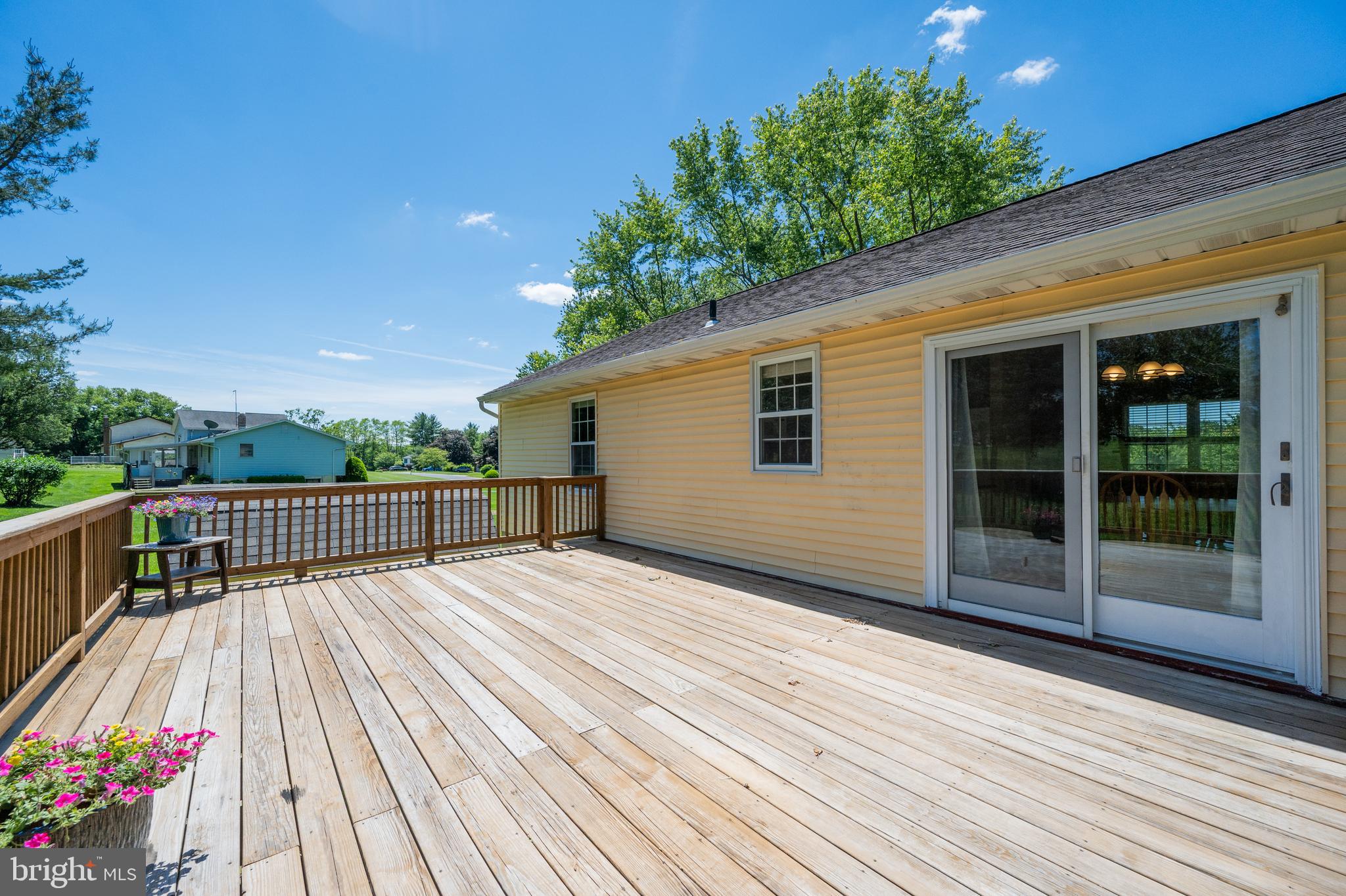4285 Wolf Hill Drive Hampstead, MD 21074 - Photo 36 of 49 a view of backyard with a deck and wooden floor