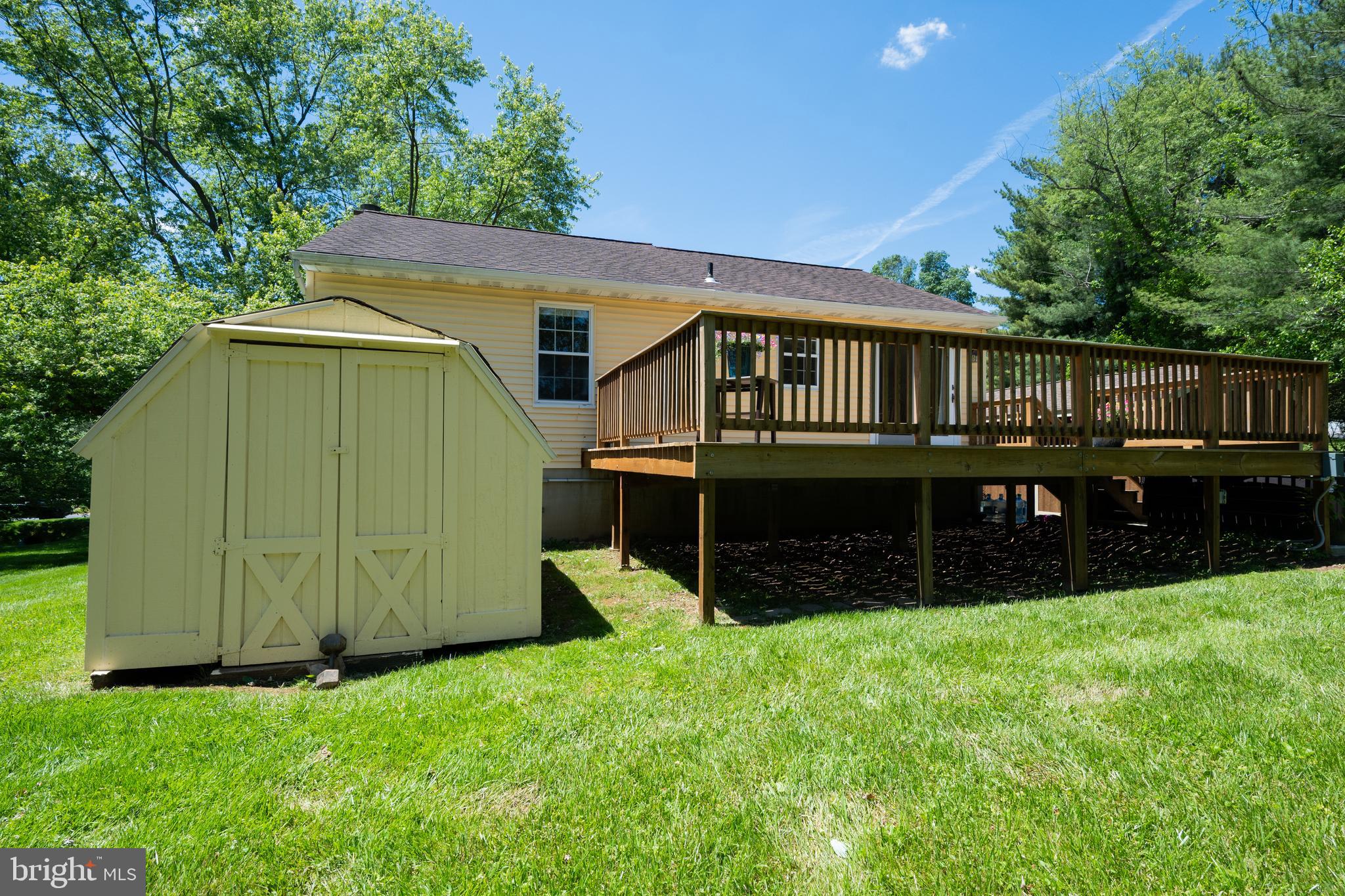 4285 Wolf Hill Drive Hampstead, MD 21074 - Photo 40 of 49 a view of a house with a backyard