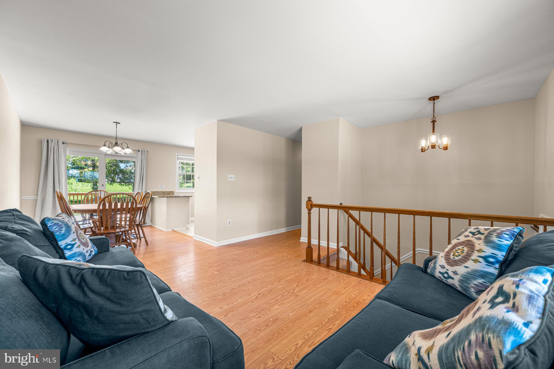 4285 Wolf Hill Drive Hampstead, MD 21074 - Photo 4 of 49 a living room with furniture and wooden floor