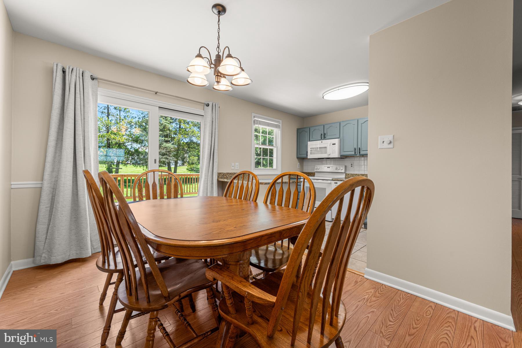 4285 Wolf Hill Drive Hampstead, MD 21074 - Photo 6 of 49 a view of a dining room with furniture window and outside view