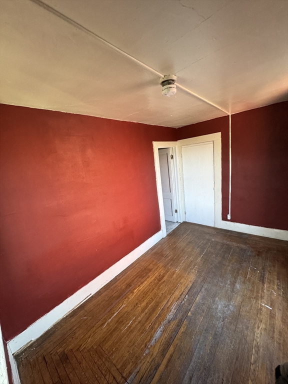 435-455 State Street Springfield, MA 01105 - Photo 5 of 13 an empty room with wooden floor and windows