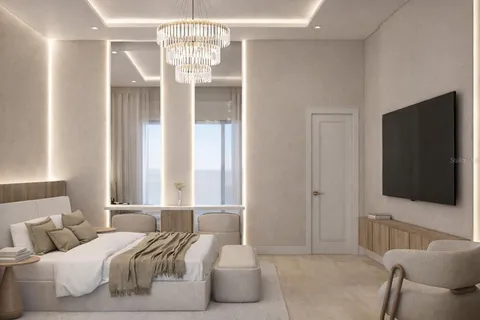 a bedroom with a bed and glass door