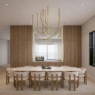 a dining room with furniture a rug and white walls