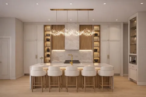 a kitchen with a table and chairs