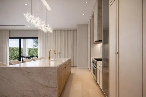 a spacious bathroom with a double vanity sink and a large mirror