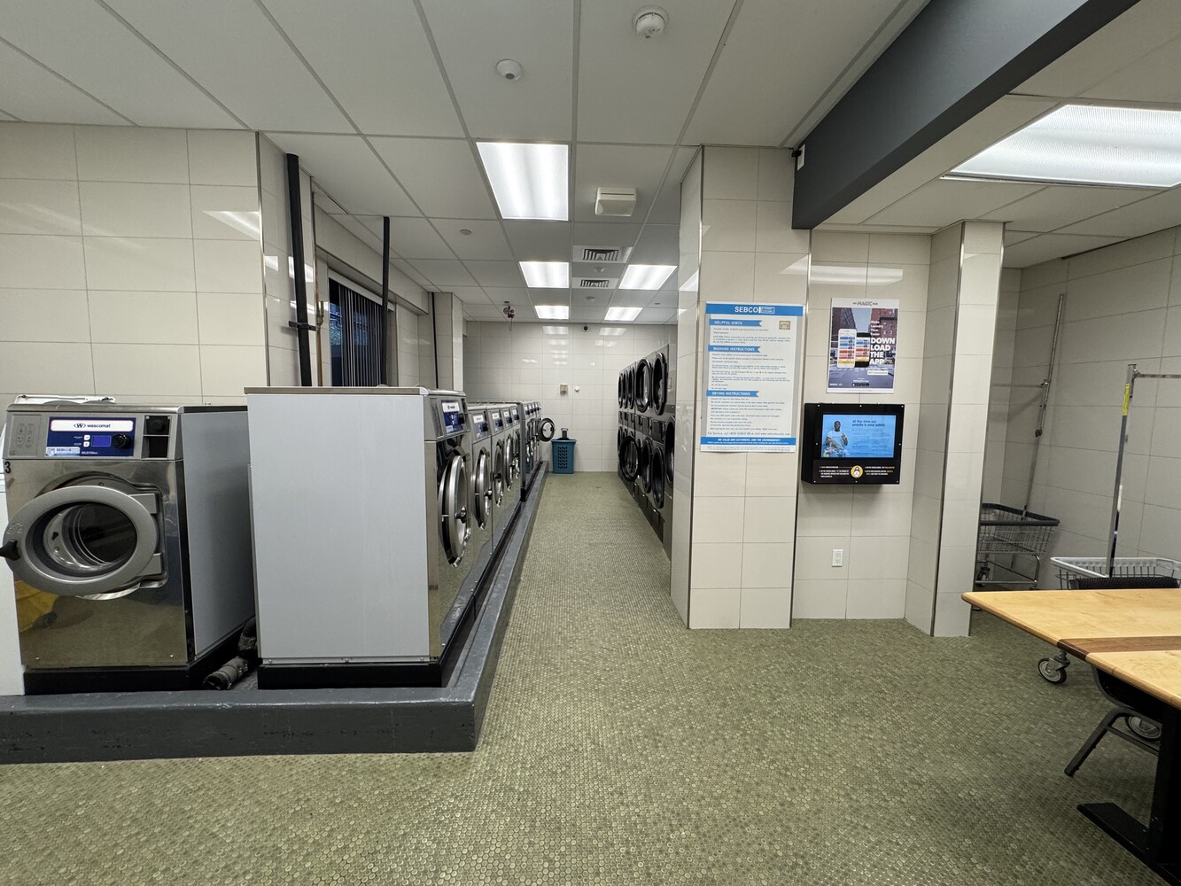 377 Rector Place, Unit 17D Manhattan, NY 10280 - Photo 12 of 15 a view of a storage & utility room with washer and dryer