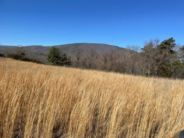 a view of mountain view with mountains in the background