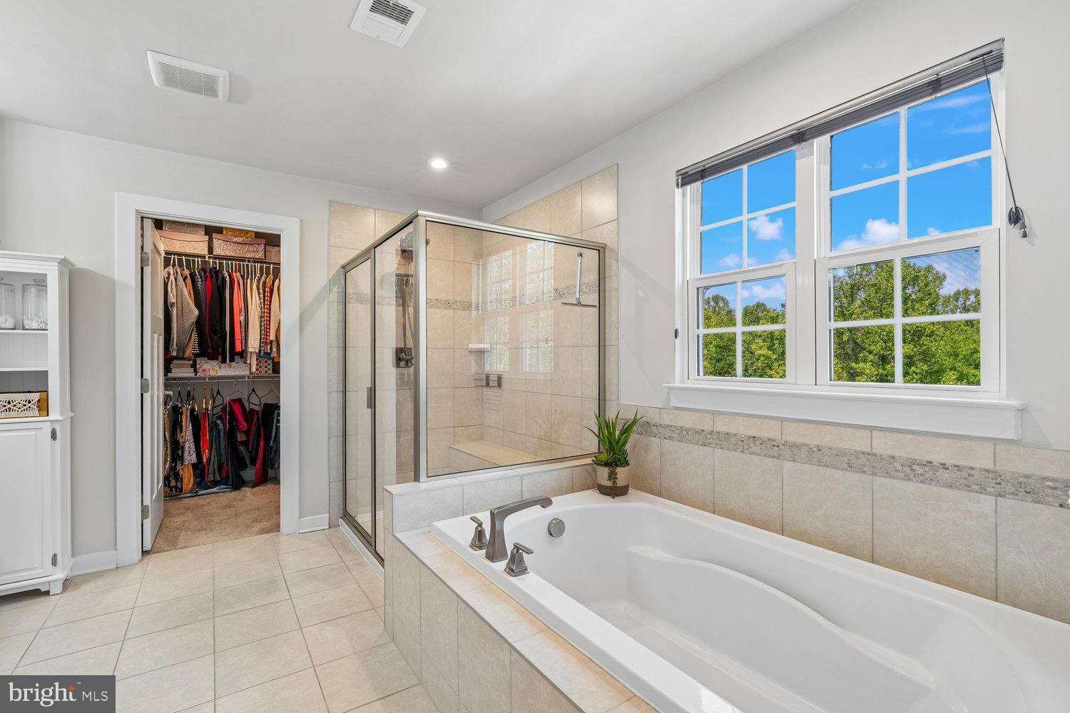 1275 Upper Patuxent Ridge Road Odenton, MD 21113 - Photo 47 of 107 WALK-IN CLOSET & SOAKING TUB W/ WINDOW ABOVE