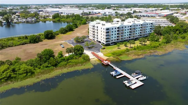 aerial view of a house with a lake view