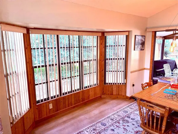 a very nice looking living room with a large window
