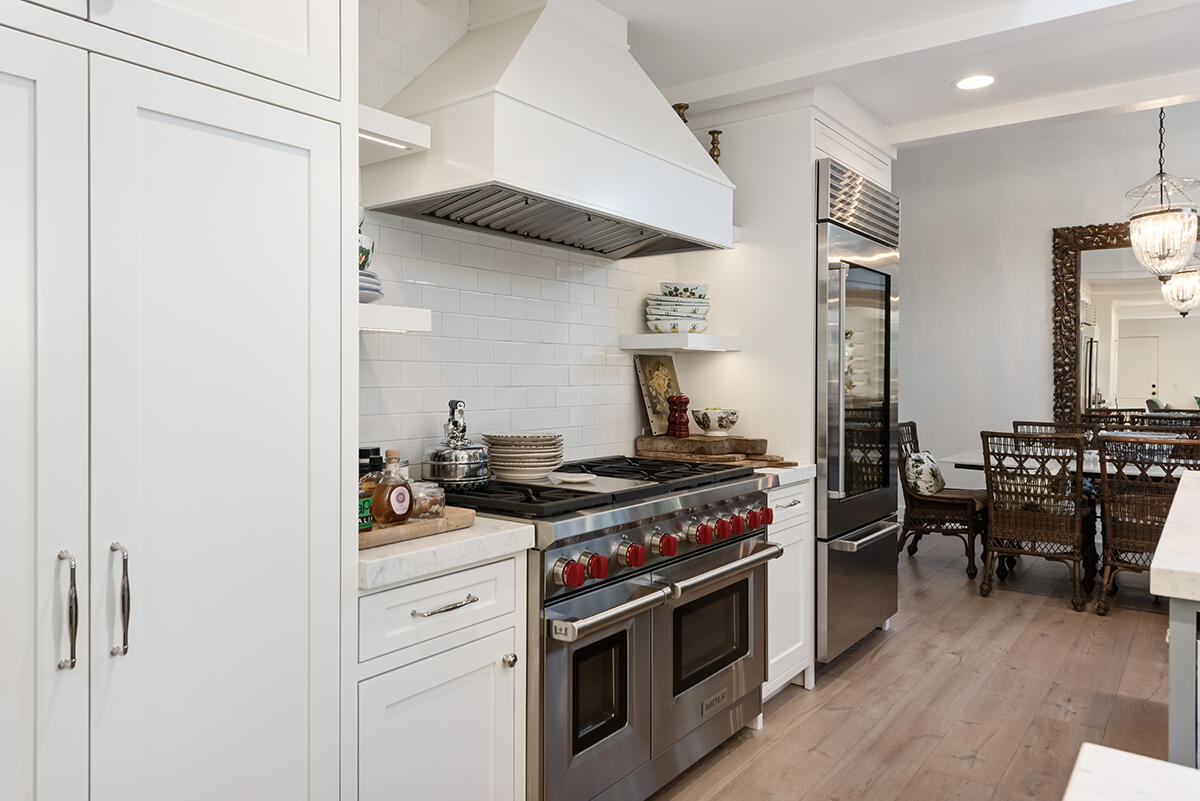 655 Romero Canyon Road Montecito, CA 93108 - Photo 11 of 23 a kitchen with stainless steel appliances a stove and white cabinets