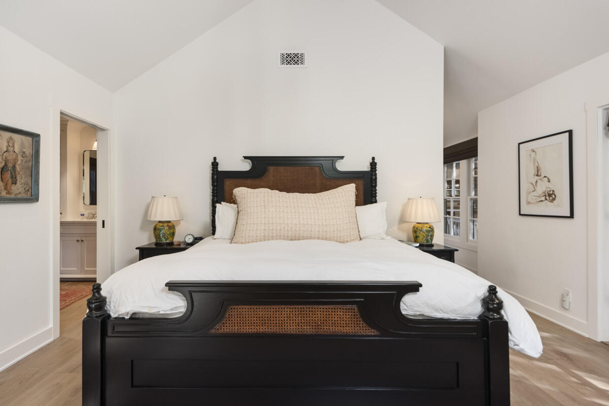 655 Romero Canyon Road Montecito, CA 93108 - Photo 16 of 23 a bedroom with a bed and wooden floor