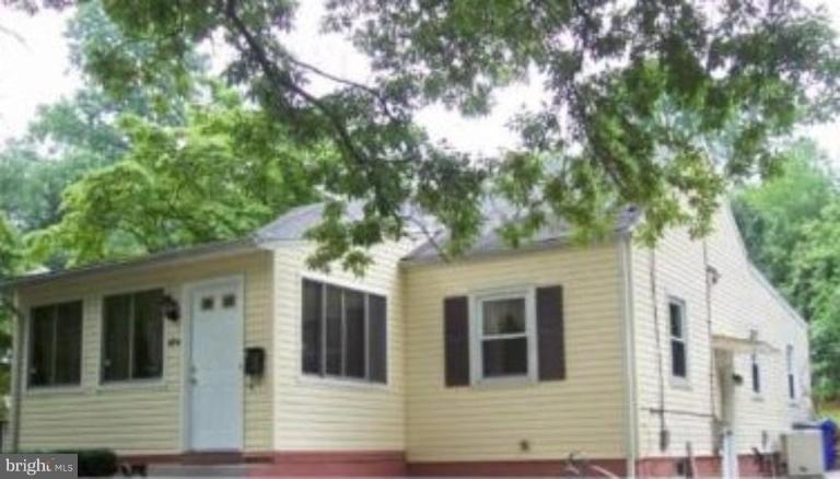 4204 Dahill Road Silver Spring, MD 20906 - Photo 1 of 1 a view of a house with a tree