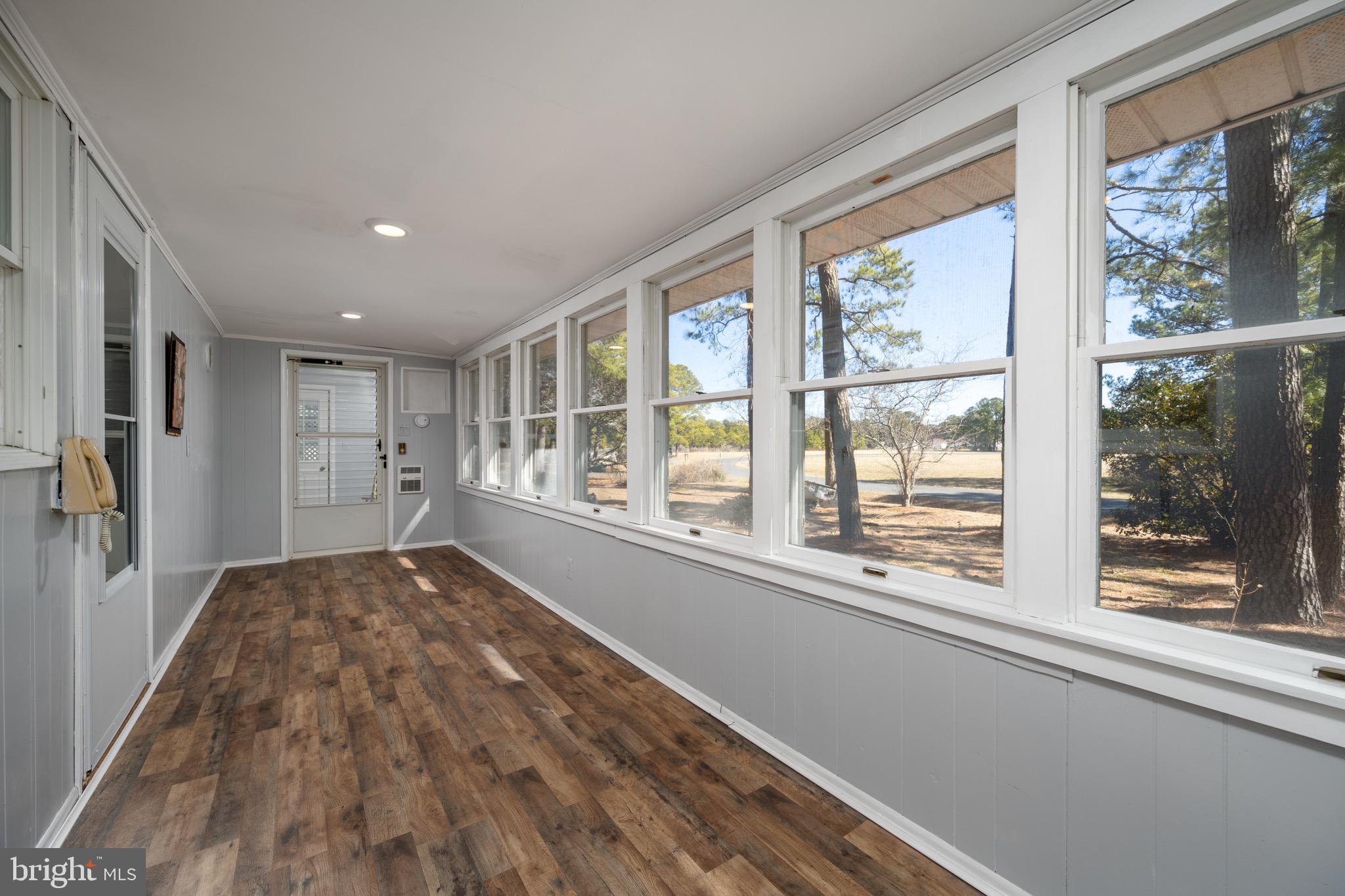 5053 Manokin Road Crisfield, MD 21817 - Photo 23 of 44 4 seasons room with access from master or kitchen