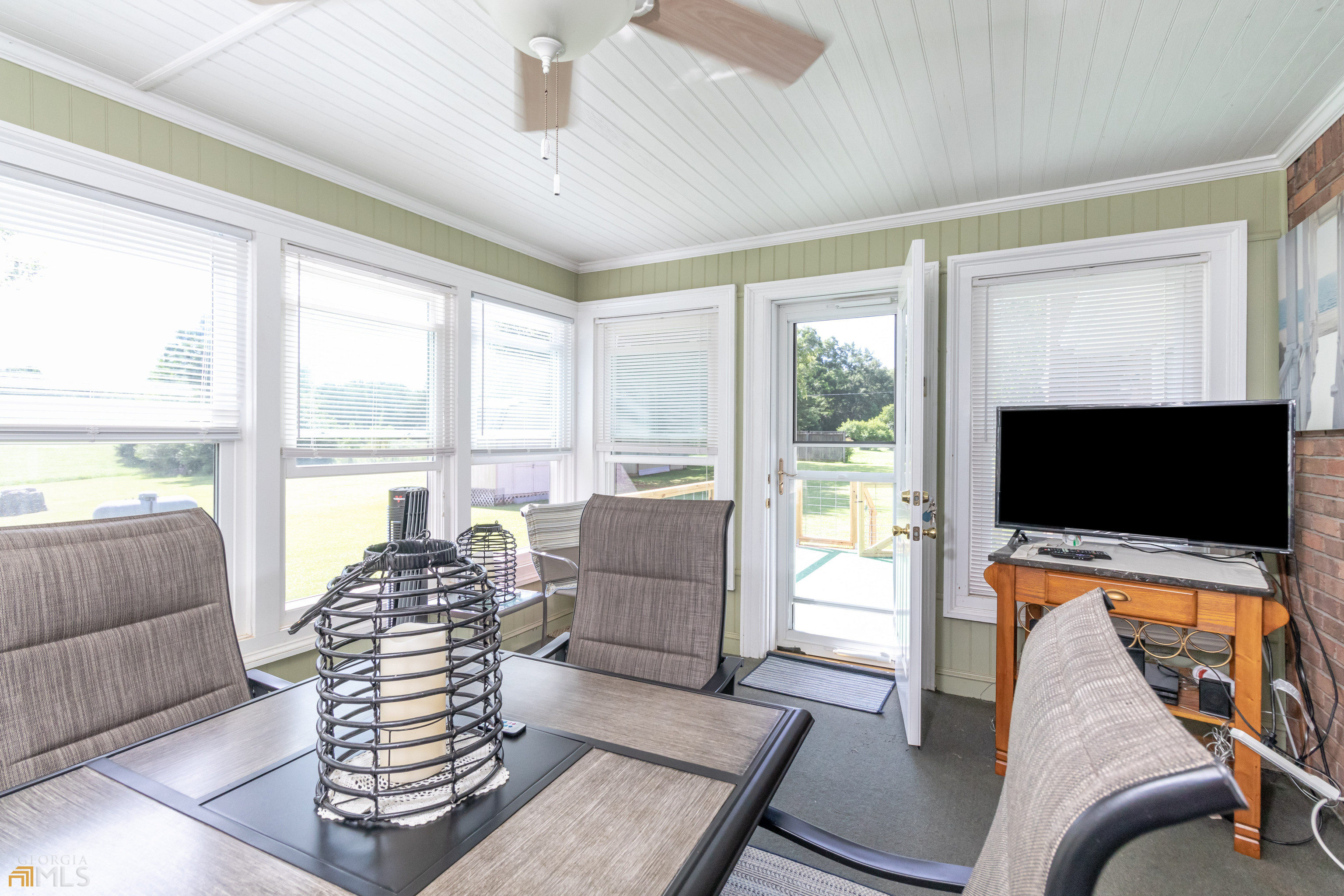 164 Jones Road Molena, GA 30258 - Photo 19 of 25 a living room with furniture and a flat screen tv
