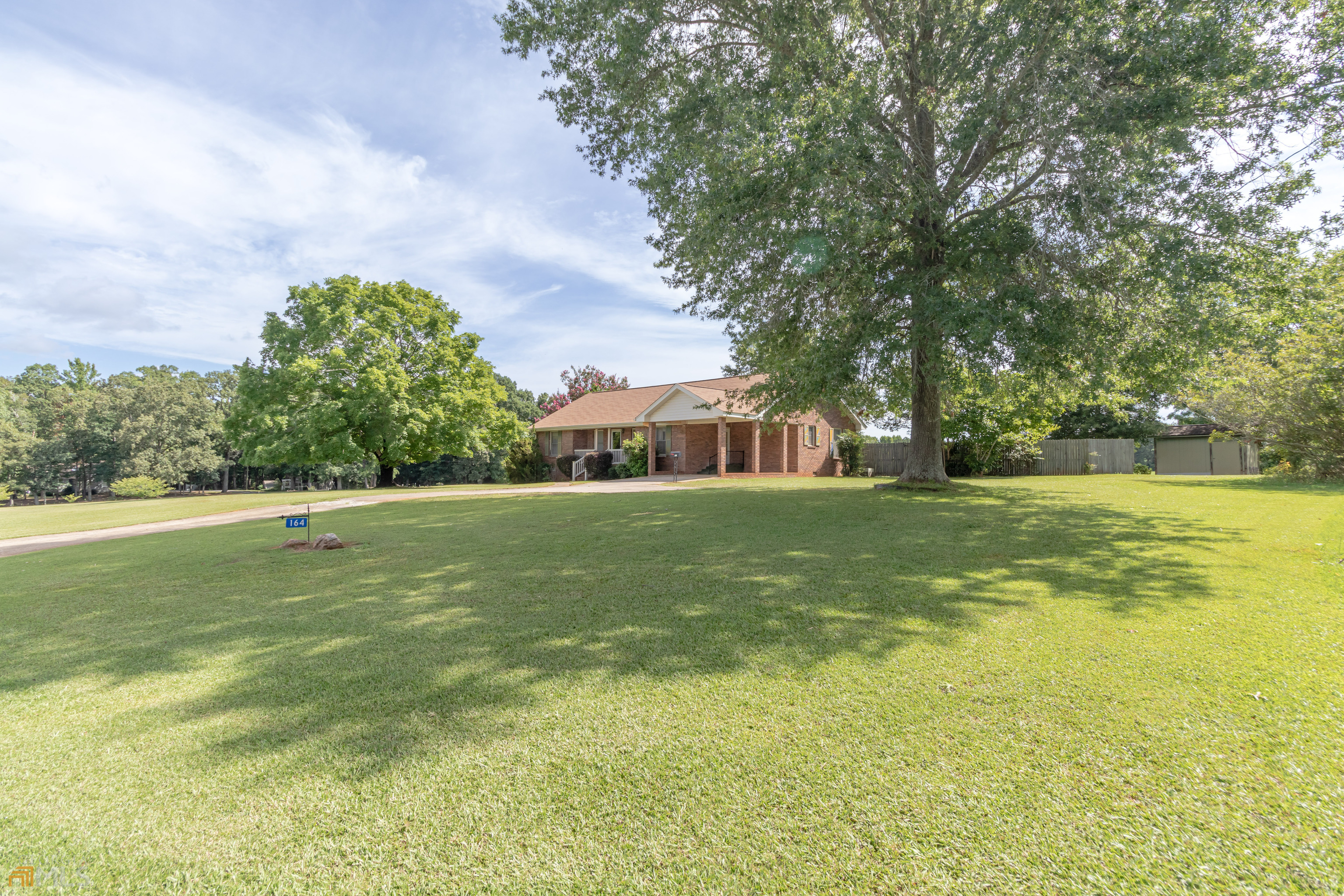 164 Jones Road Molena, GA 30258 - Photo 3 of 25 a view of a house with a large trees