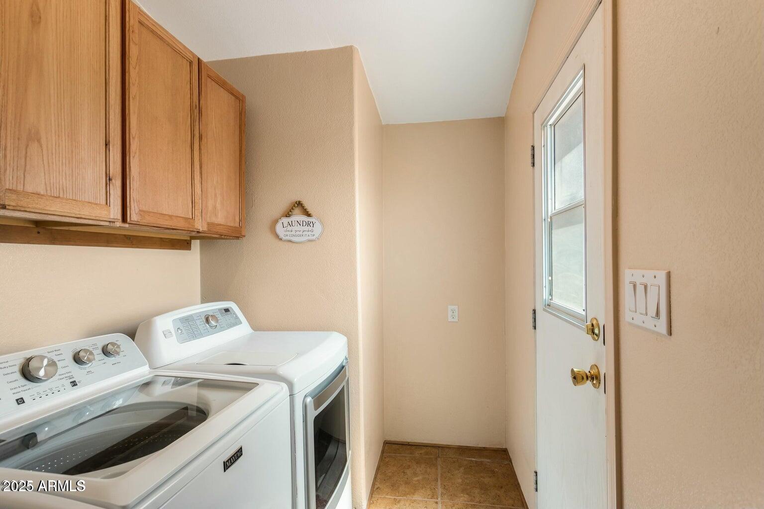 5780 South Mescalero Road Hereford, AZ 85615 - Photo 24 of 45 a utility room with dryer and washer