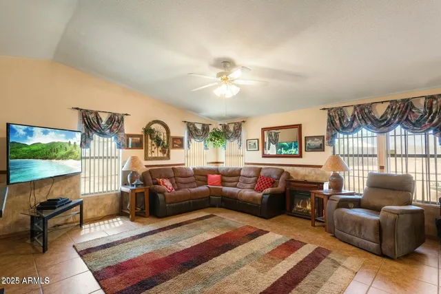 a living room with furniture and a window